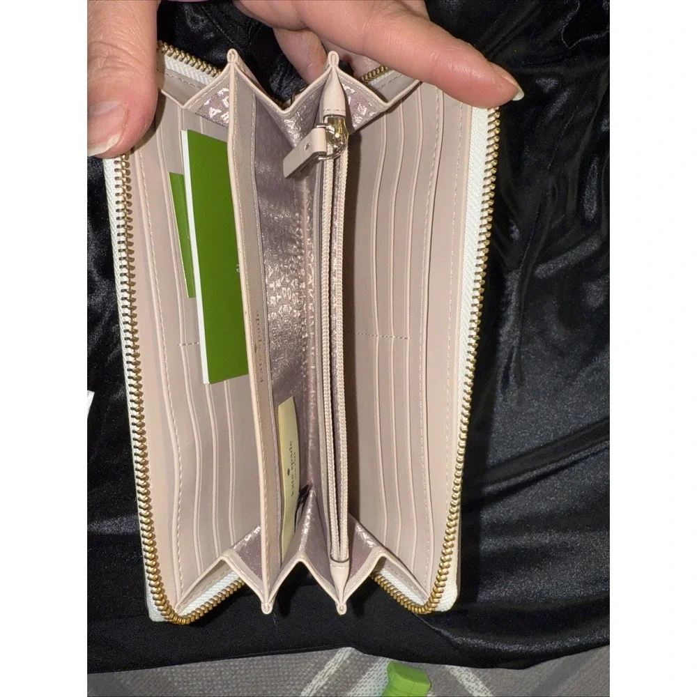 KATE SPADE large zip around white and tan wallet brand new